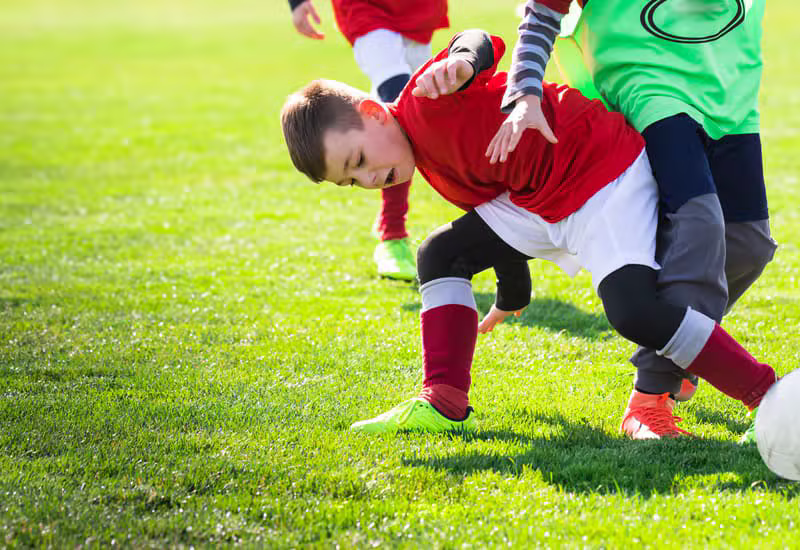 Grassroots football tackle