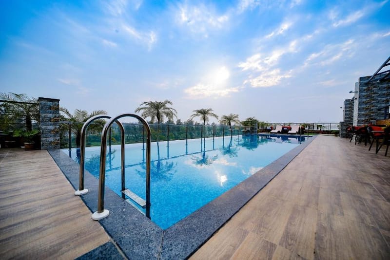 Tranquil outdoor pool at a luxury nature resort