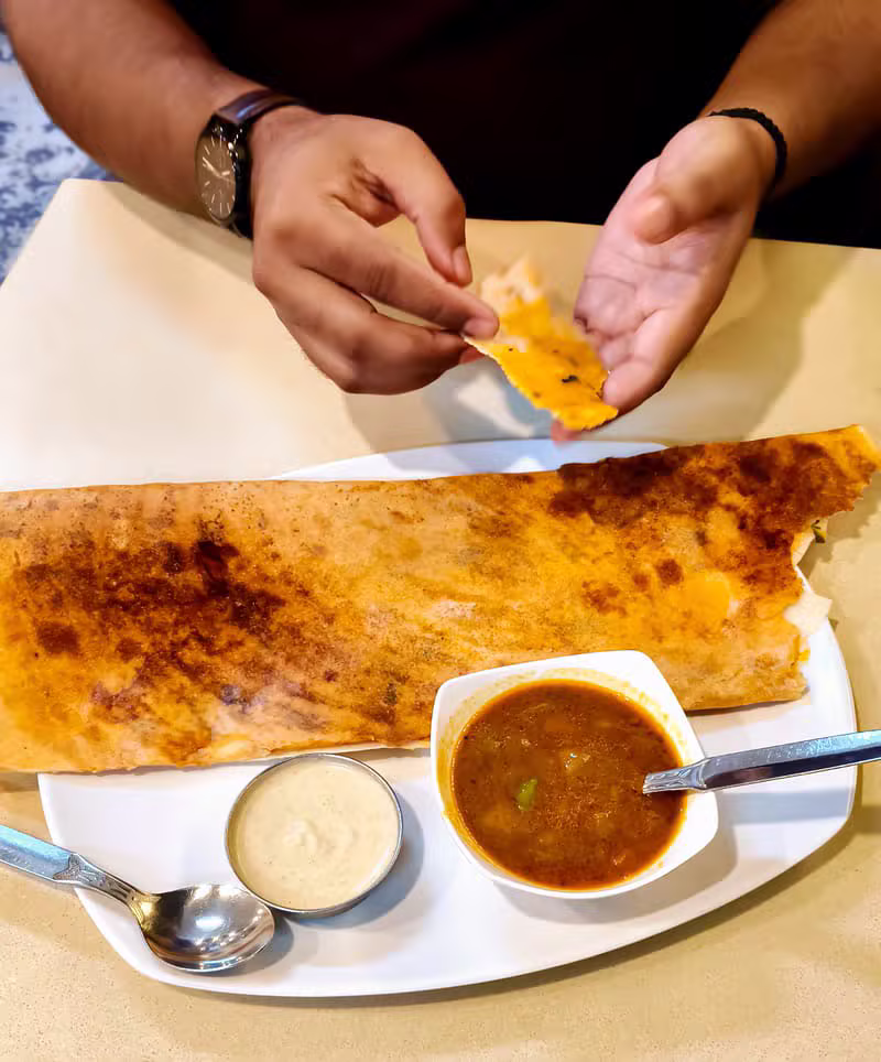 Crispy South Indian dosa with chutney and sambar