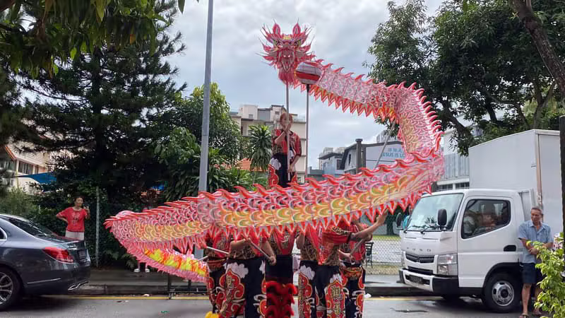 Dragon dance blessing at a Katong Laksa shop