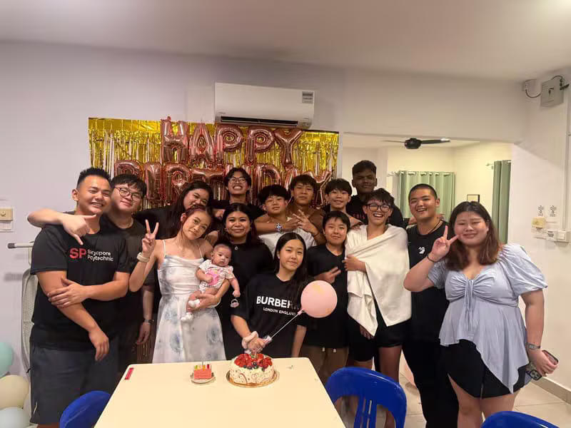 Hong Quan teammates celebrating a birthday together