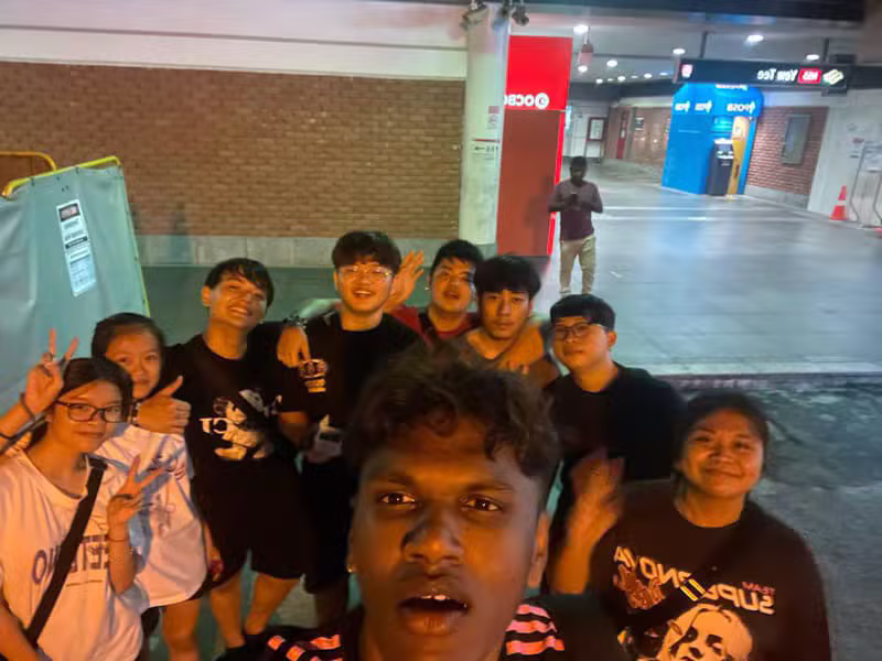 Hong Quan troupe gathering outside the MRT station in the evening