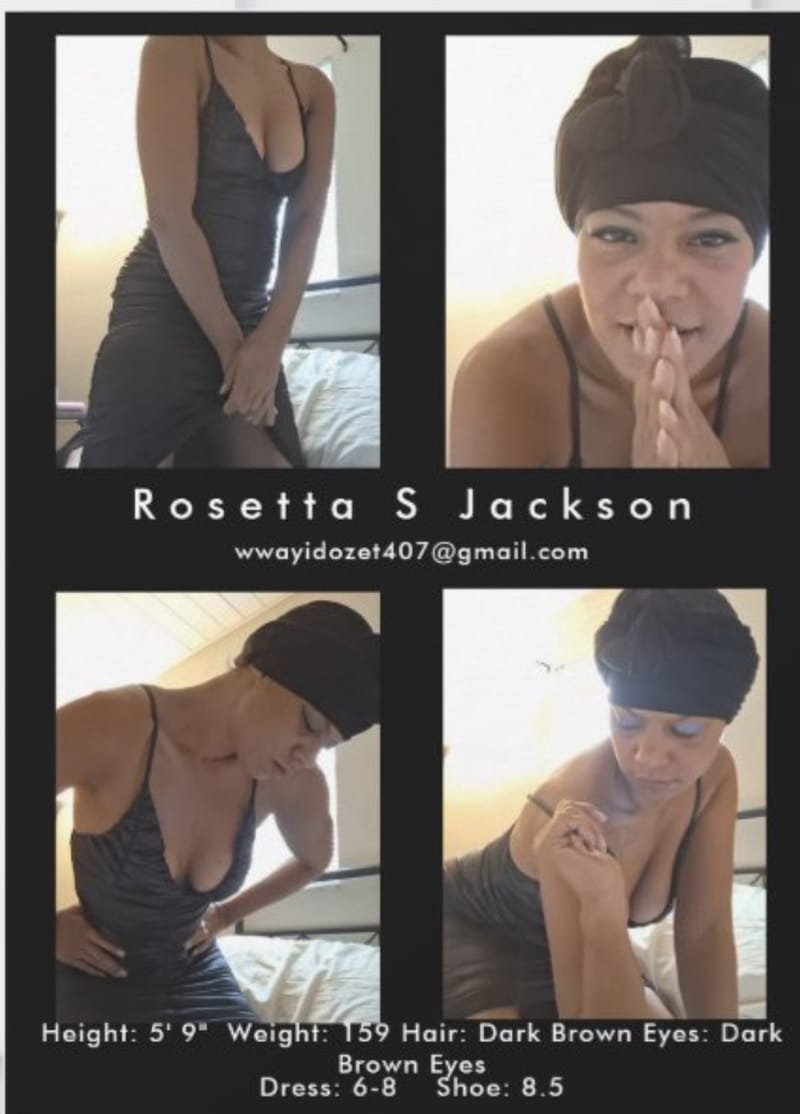 Vocalist recording in a studio vocal booth