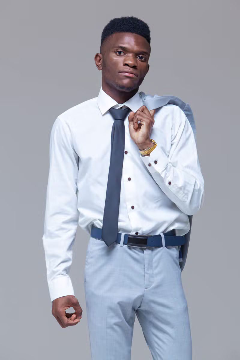 Nigerian male model showcasing refined contemporary African menswear