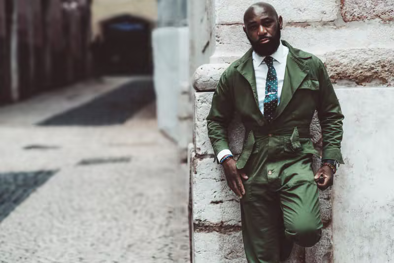 African male model wearing a tailored safari suit