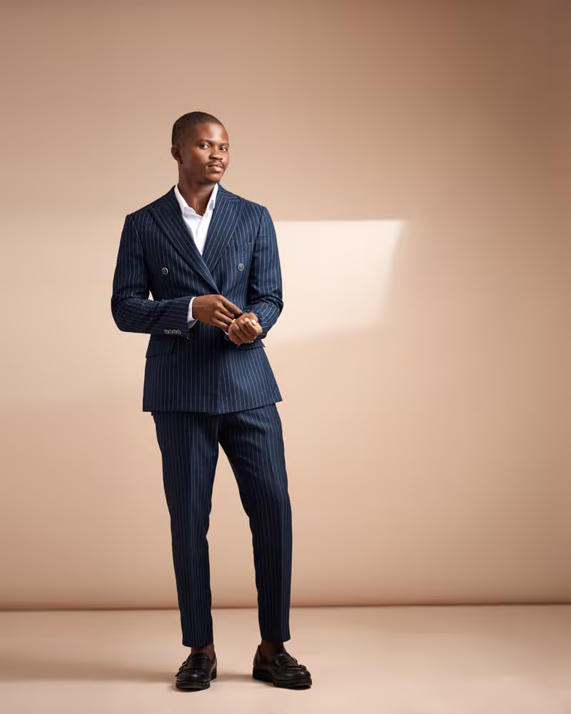 Nigerian male model wearing formal tailored menswear