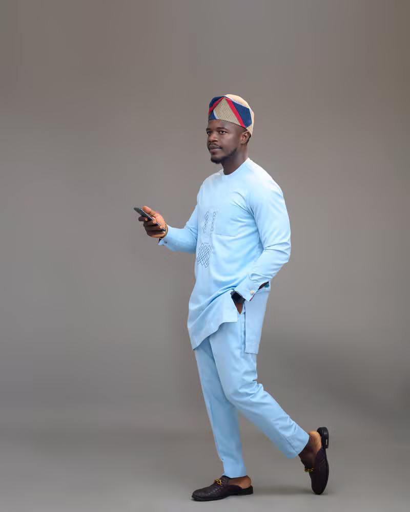 Nigerian male model in modern menswear with subtle traditional influence
