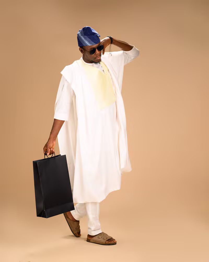 African male model wearing refined agbada traditional fashion
