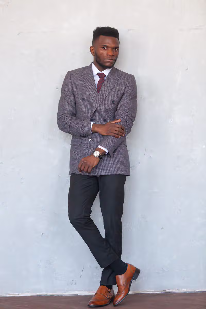 African male model wearing a double-breasted formal suit