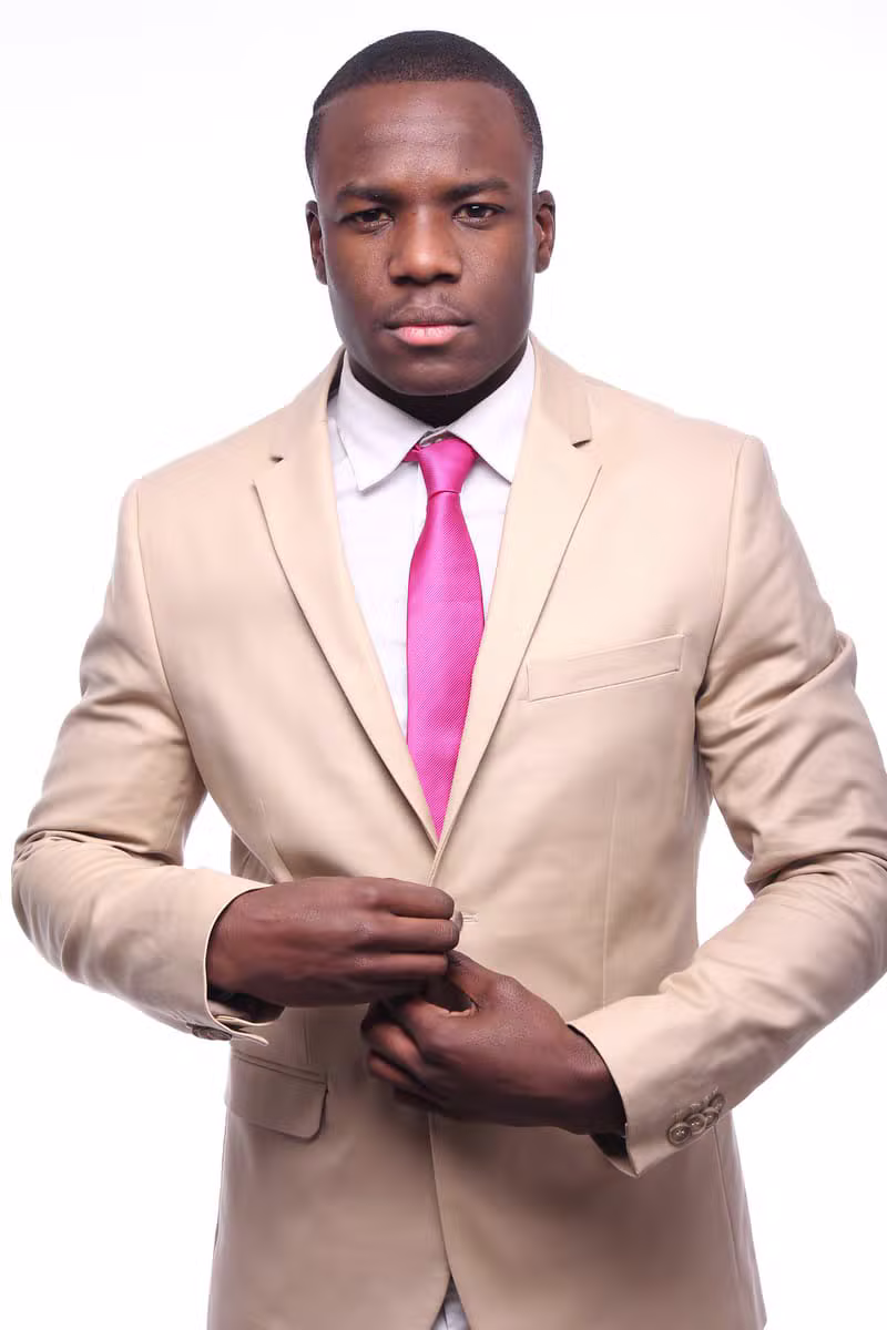 African male model wearing a light formal suit