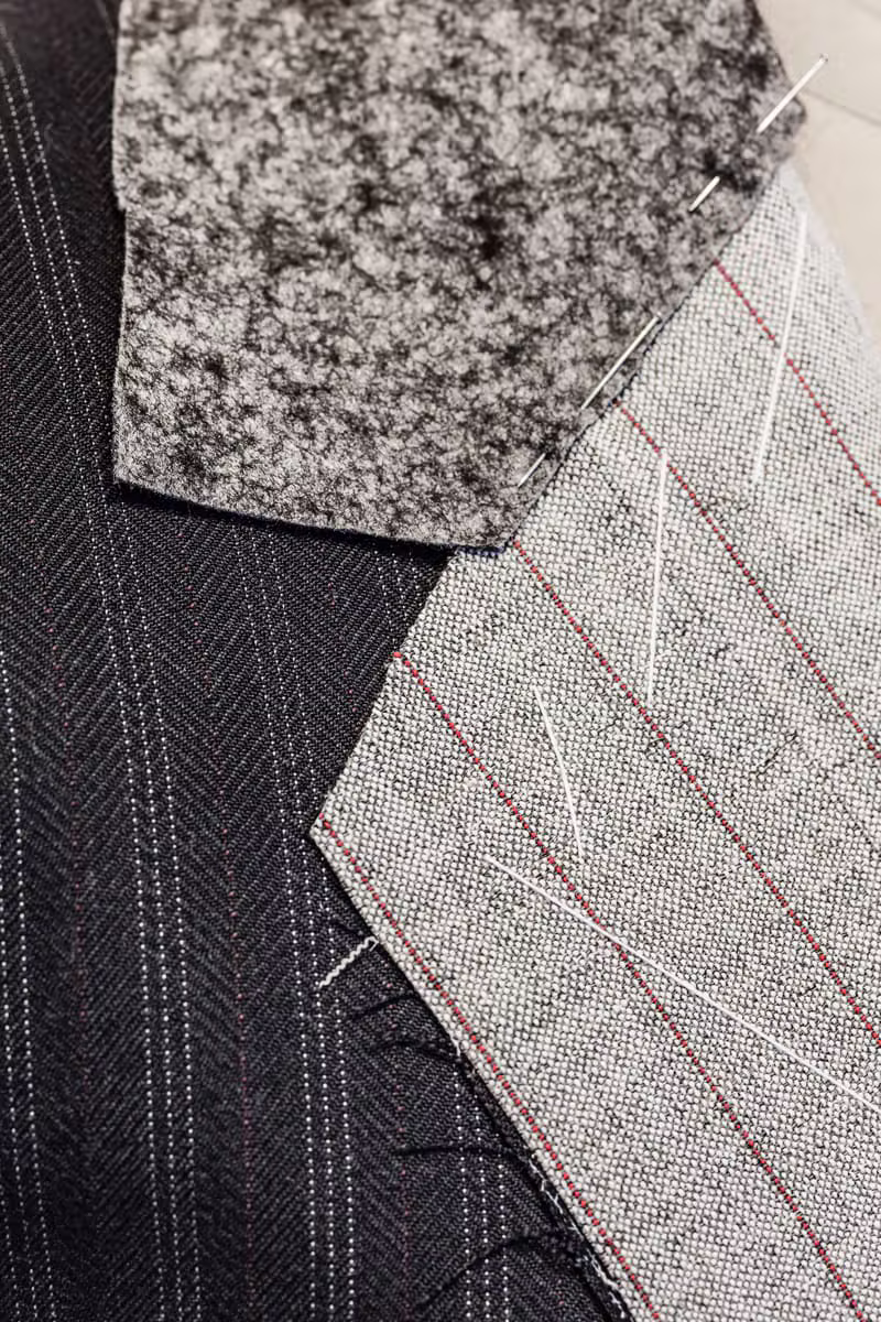 Close-up menswear tailoring fabric swatches
