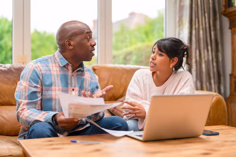 Indian family reviewing their financial protection plan together