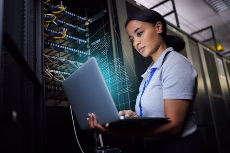 IT professional configuring server infrastructure