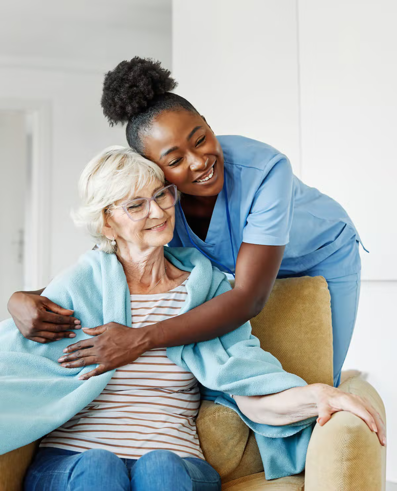 Healthcare professional discussing care plan with family members