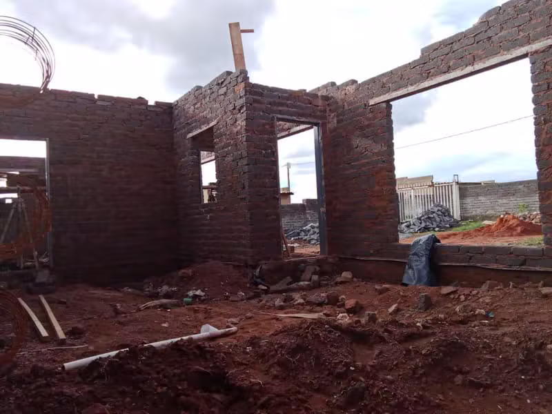 Brick building shell with door and window openings