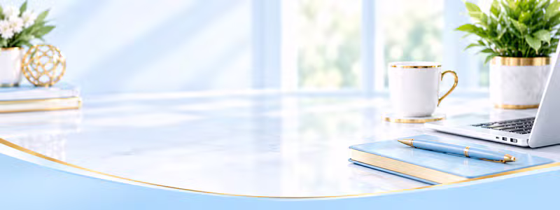Bright professional office desk with a white coffee cup, blue notebook, pen, laptop, and potted plants by a sunlit window