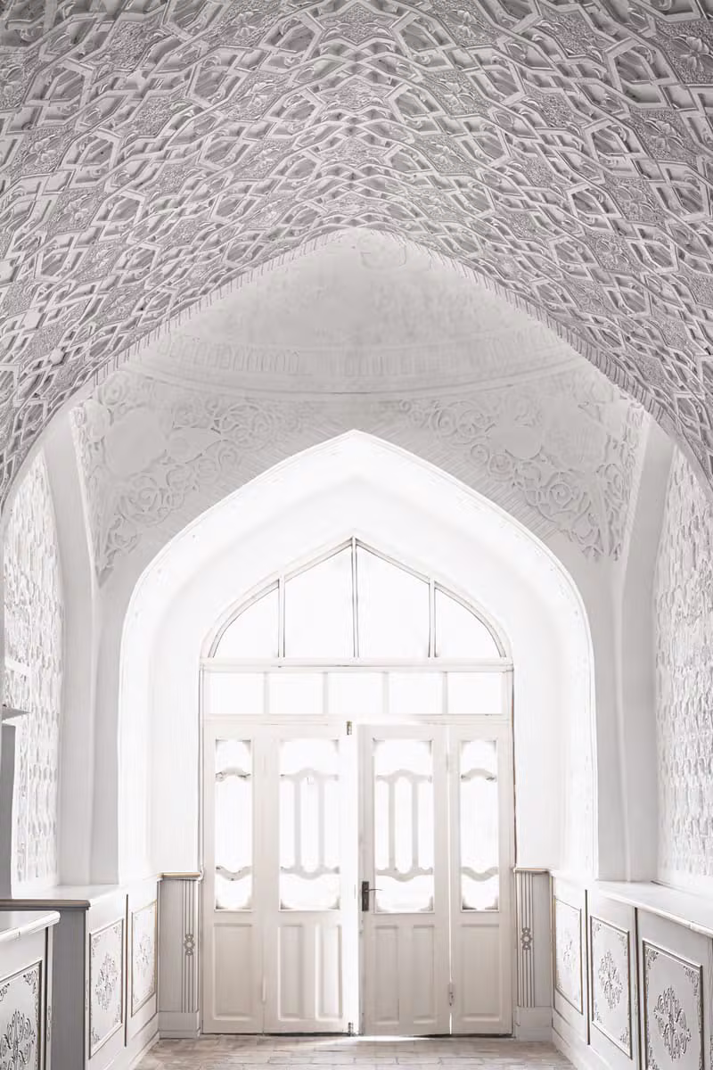 Elegant finished interior with smooth arched ceilings and refined plaster detail