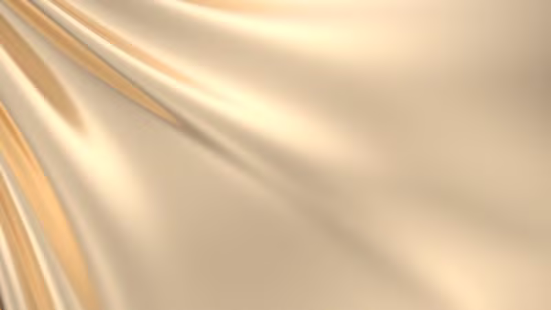 Close-up of golden silk fabric