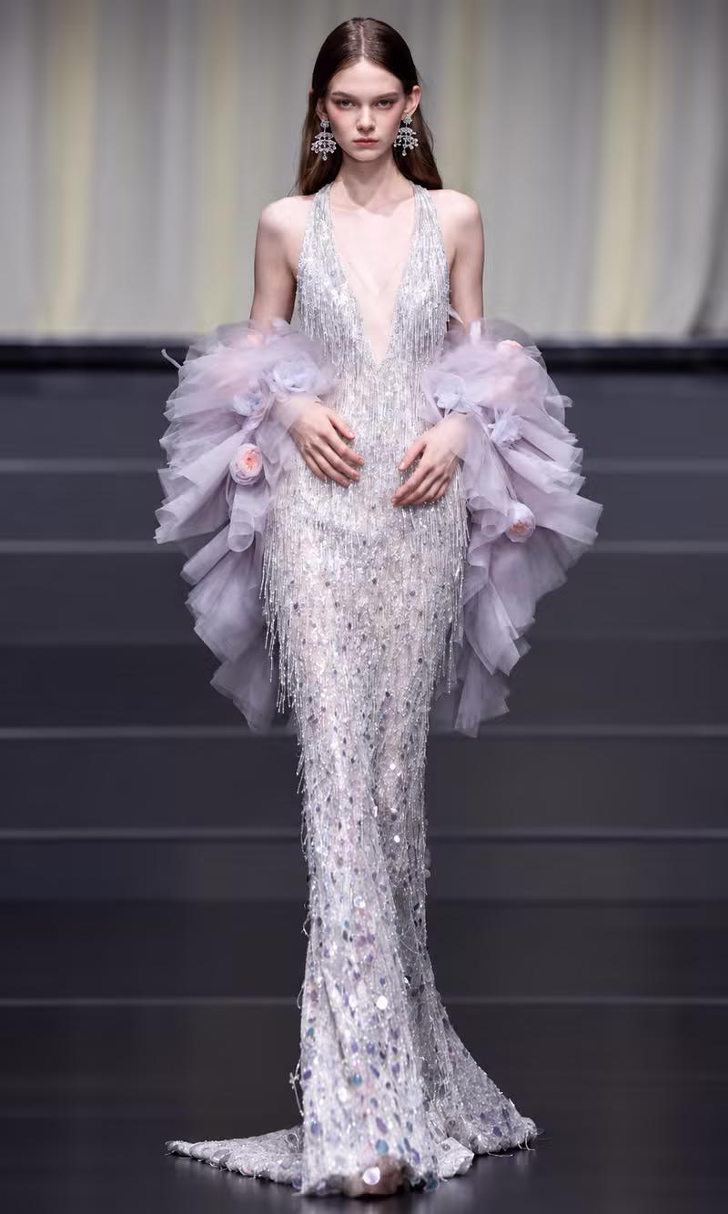 Lilac sequined couture gown with voluminous tulle ruffle sleeves