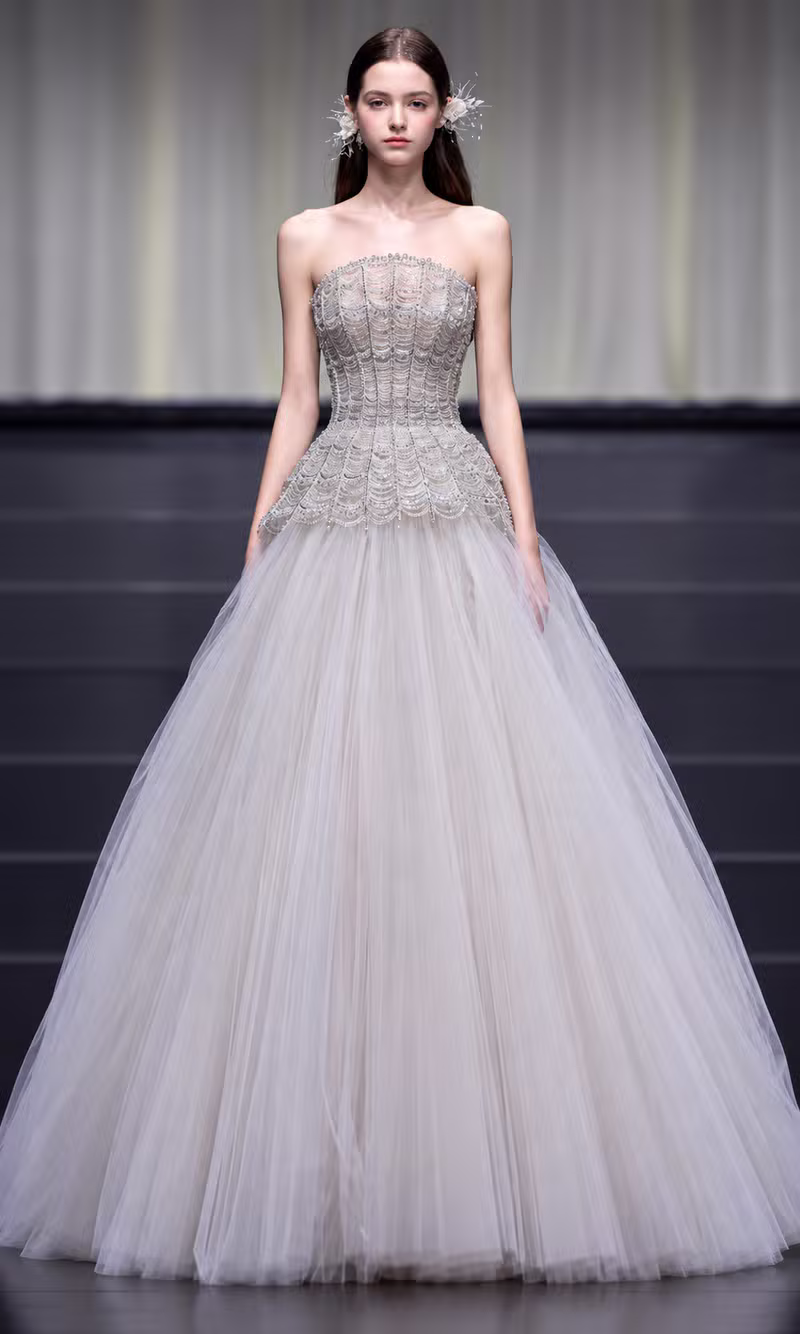 Champagne crystal corset couture ball gown with a full tulle skirt