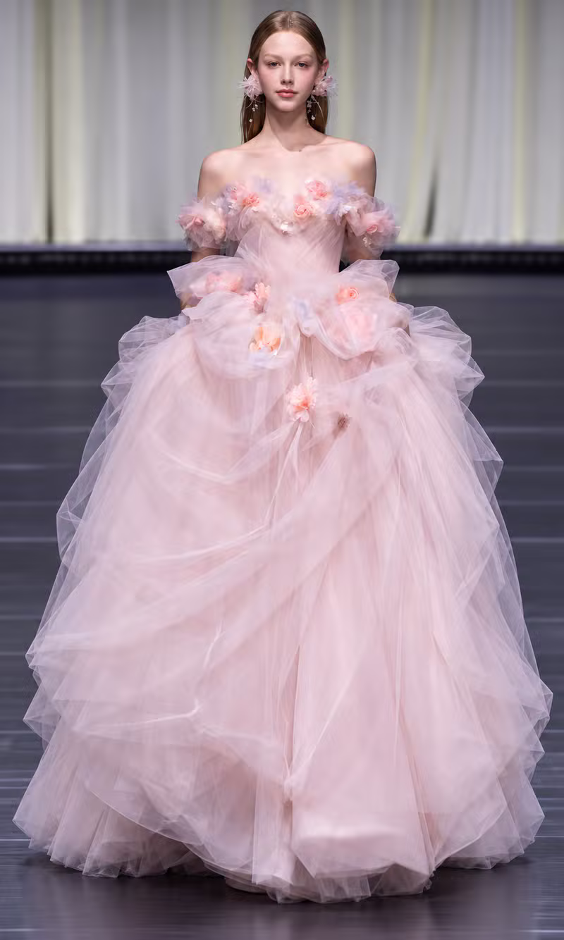 Blush pink tulle couture ball gown with rose applique detailing