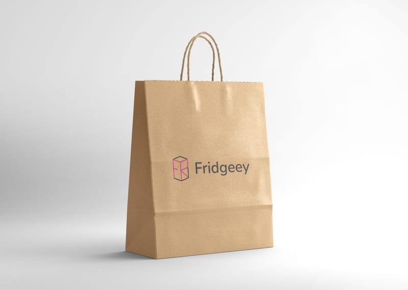 Fridgeeey logo applied to a kraft paper shopping bag