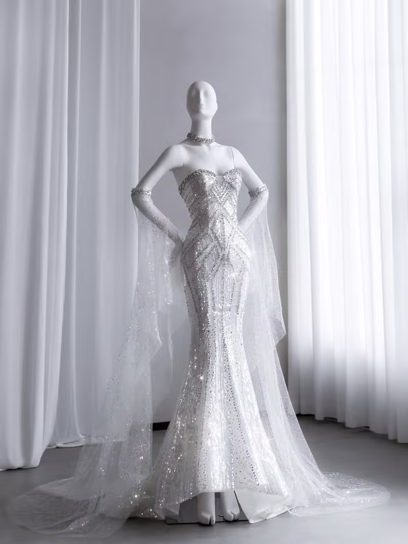 Silver Radiance — Intricate silver beadwork with a flowing, sculpted silhouette by KALVERE LUMIERE