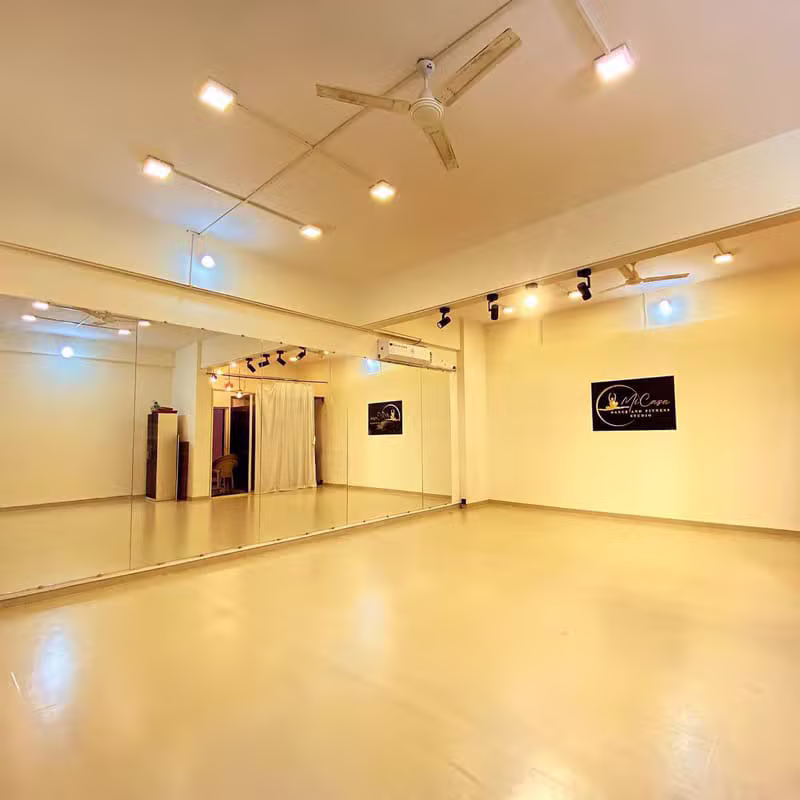 Bright MiCasa dance studio with mirrored walls and lighting