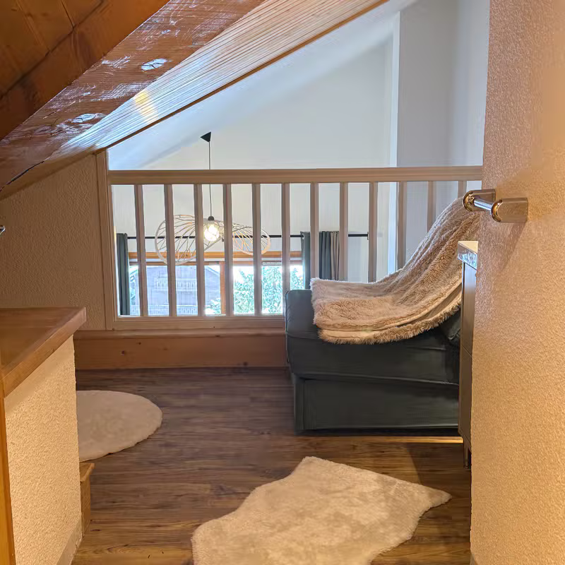 The mezzanine with extra beds under the roof