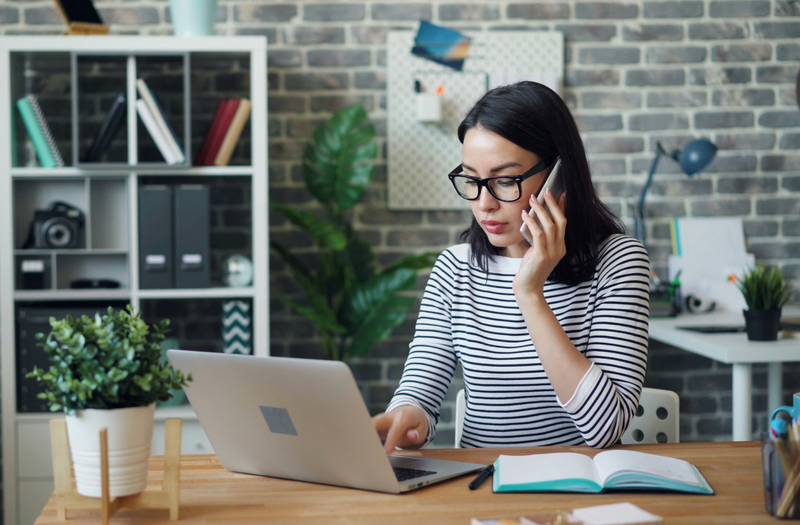 Editor reviewing business strategy notes at a desk