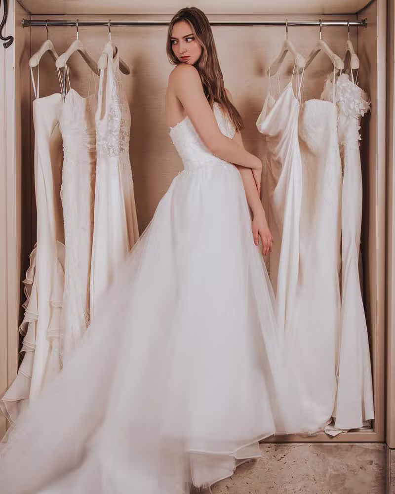 Radiance Rare bride in a tulle gown in the fitting room