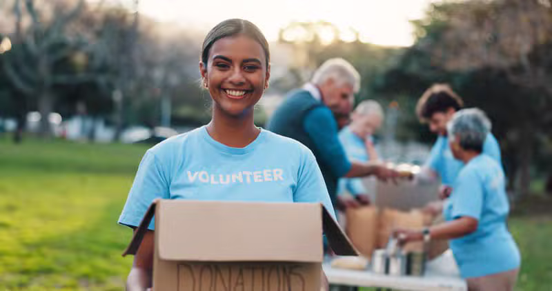 Community volunteers gathered together at an outreach event