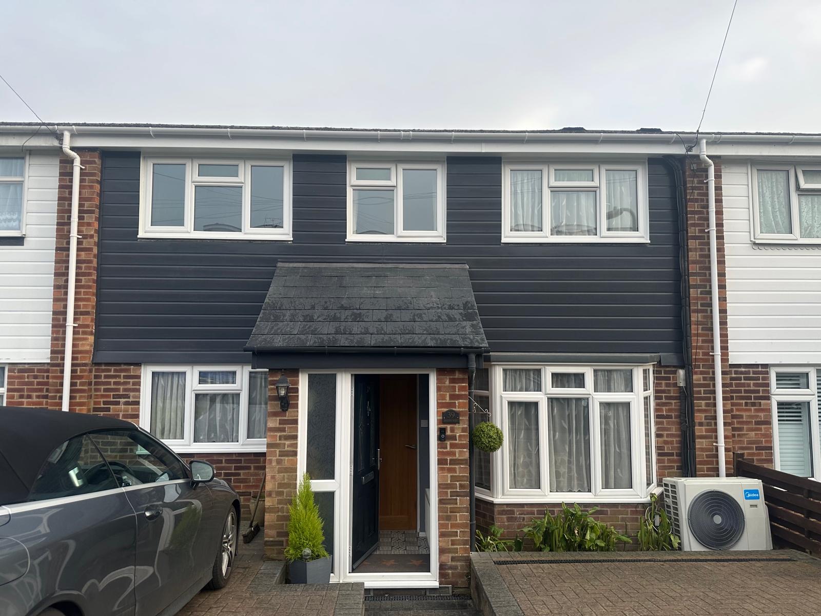 new facade, new bay window roof, roofline and conversion from flat roof over porch to lean-to-roof