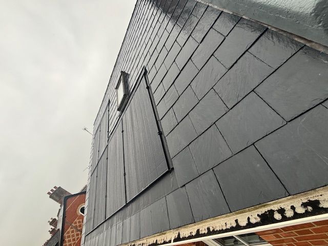 new slate roof including in roof solar system