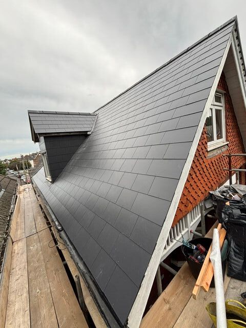 Insulated fibercement roof