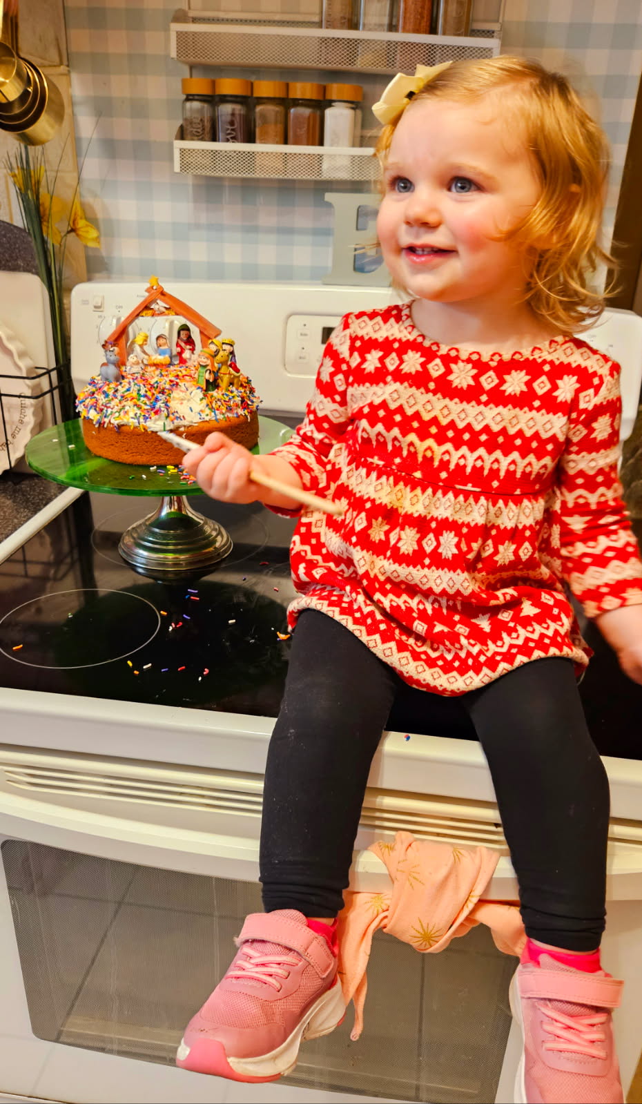 TGC BABY LAMB DECORATING JESUS' B/DAY CAKE