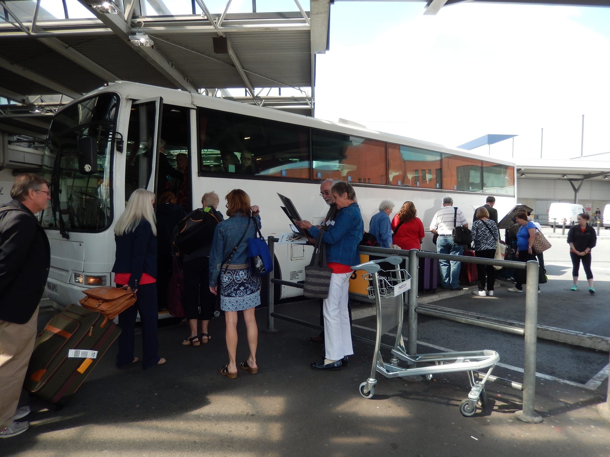 CFA members boarding buses at Heathrow Airport in 2014