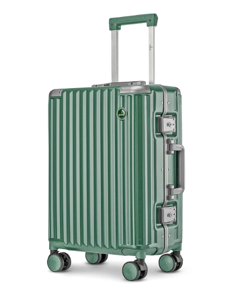 A vertical hard case green Stark suitcase with four wheels and a telescopic handle, placed against a white background.