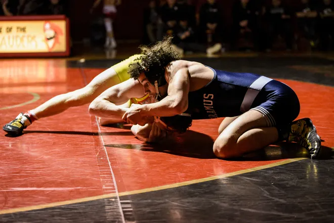 Will Grater from Bergen Catholic wrestles Eric Freeman from Paramus in a 138 pound match during the NJSIAA Region 2 wrestling tournament at Mount Olive High School on Saturday February 29, 2020. Cedeno won the match. 