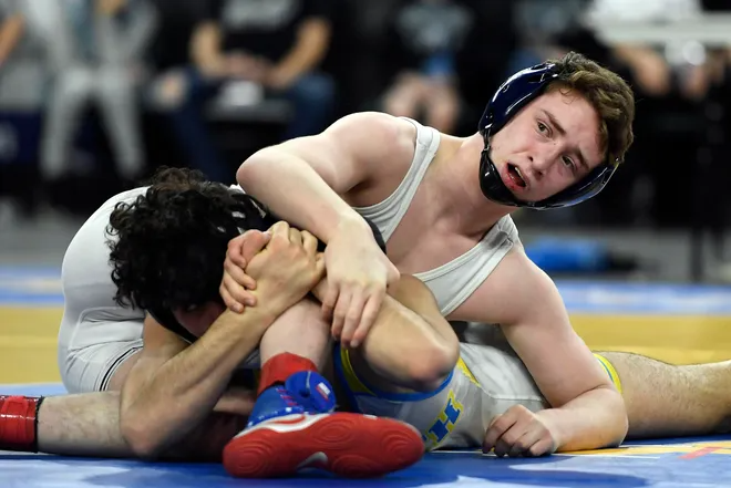 Aaron Ayzerov of Paramus looks at the clock during the 152-pound final bout against Nick Boggiano of Toms River North during the NJSIAA State Wrestling Championships at Boardwalk Hall in Atlantic City on Saturday, March 7, 2020.