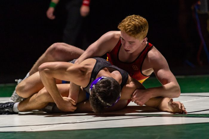 Aaron Ayzerov of Paramus (top) battles Jack Kelly of Rumson-Fair Haven during the 170 pound wrestling final of the Mobbin Classic at St. Joseph High School in Metuchen on Monday, February 15, 2021