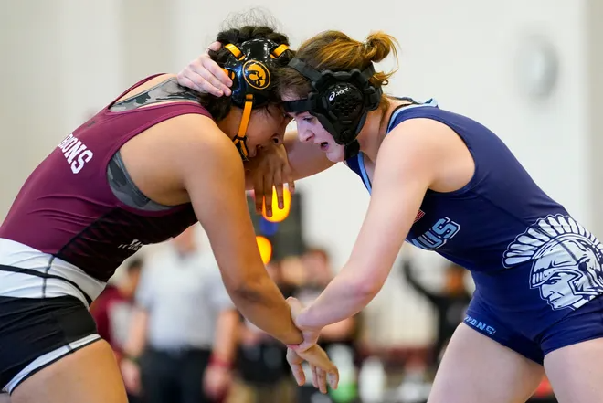 Kamila Castro of Ridgewood, left, wrestles Emma Mees of Paramus during the NJSIAA girls state wrestling semifinals at Phillipsburg High School on Sunday, Feb. 26, 2023.