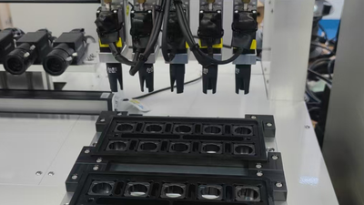 Soft Robotic Gripper for Internal Picking and Tray Loading of Plastic Camera Frames