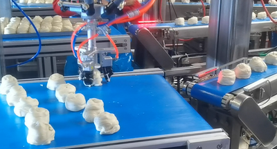 Soft Robotic Gripper for Dough Handling: How to Automate Sticky and Deformable Dough Picking?