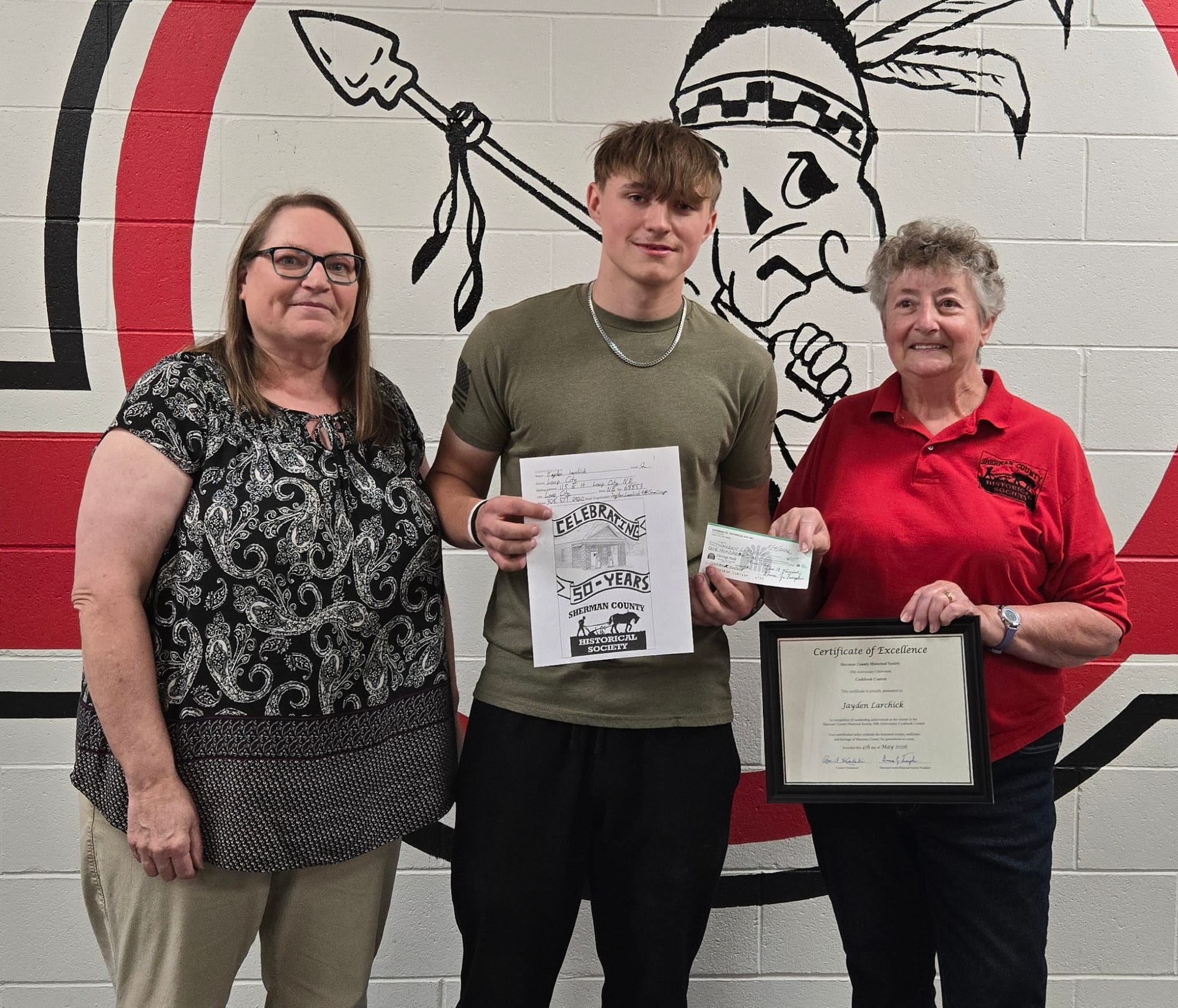 Mrs. Deb Miller, Jayden Larchick, & Donna Trompke, President of Sherman County Historical Society.