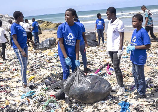 Students, during a beach clean-up exercise at Mighty Beach, Tema, to demonstrate to them where their plastic waste ends up when disposed of inappropriately