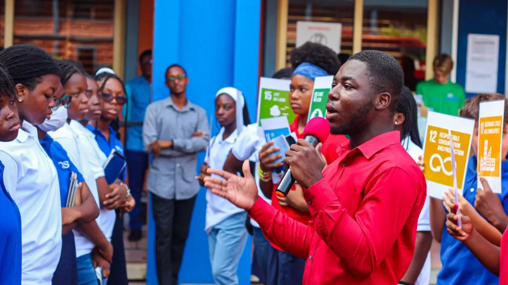 YRE Ghana’s Youth Board Chair, Mr. Michael Ackon, speaking to the students at the gathering