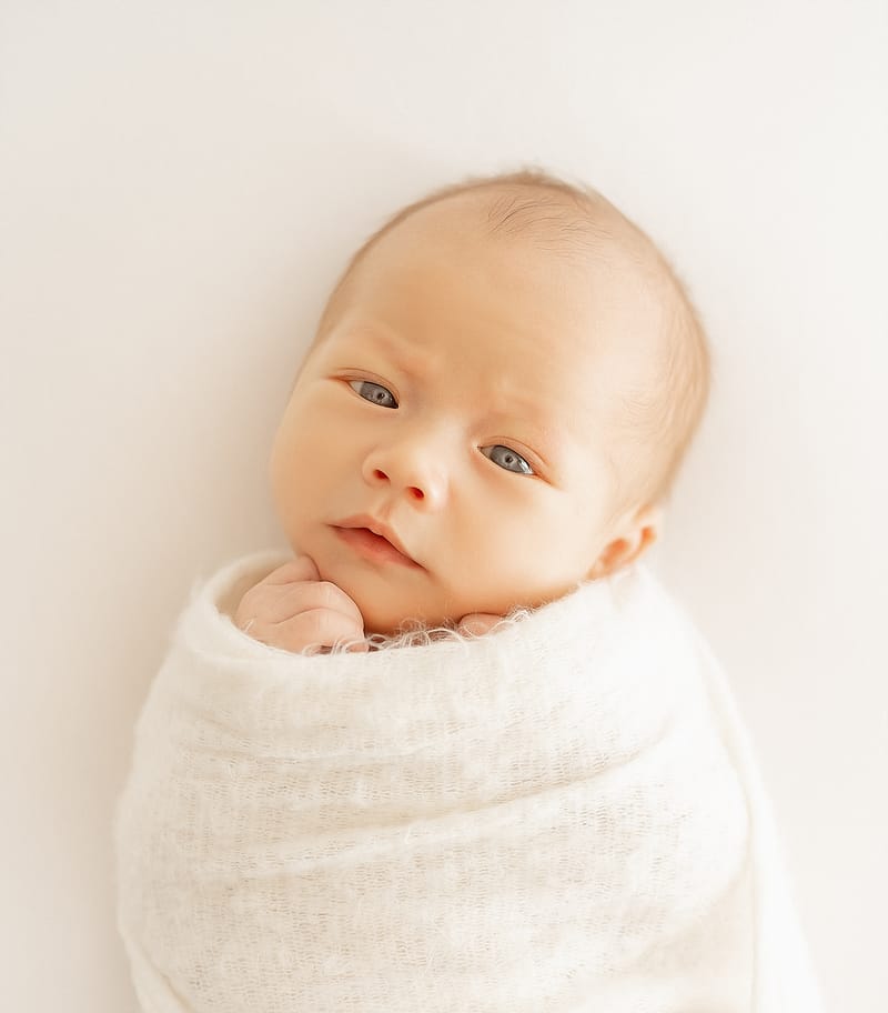 צילומי ניובורן בסטודיו או בית הלקוח