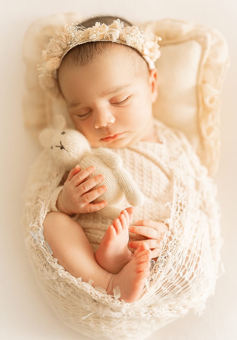 צילומי ניובורן בסטודיו או בית הלקוח