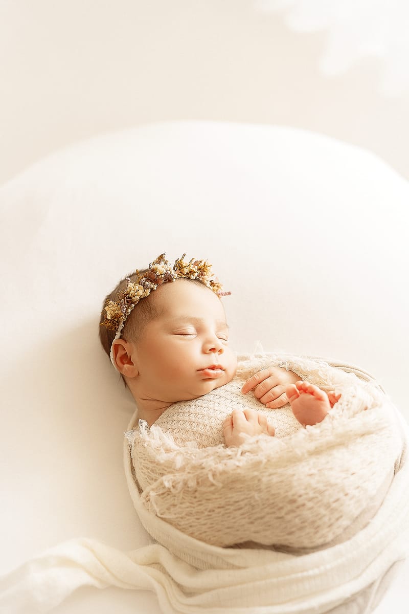 צילומי ניובורן בסטודיו או בית הלקוח